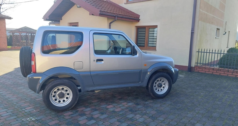 Suzuki Jimny cena 35700 przebieg: 155460, rok produkcji 2011 z Nidzica małe 211